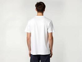 White t-shirt mockup back view. Man in white t-shirt without pattern view from back isolated on white background, t-shirt for design print, white shirt mockup with plain white background photo