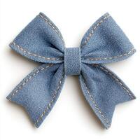 Denim bow in soft blue fabric with contrasting stitching showcasing a stylish accessory for various uses photo
