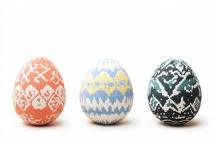 Stitch embroidered Easter eggs isolated on white background showcasing vibrant colors and intricate patterns. Ukrainian embroidery vyshyvanka styled Easter eggs photo