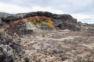 Rocky area with a hole in it photo
