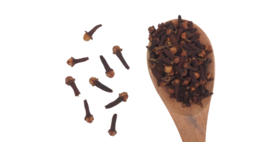 Top View of Scattered Dried Cloves with Wooden Spoon on Transparent Background png