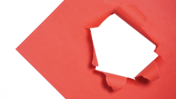 Torn Hole in Sheet of Red Paper on Transparent Background png