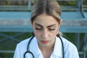 Tired Doctor Reesting For Some Minutes photo