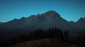 A view of a mountain range at night video