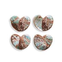 Set of Seashells as heart, sea and ocean nature love concept, natural texture closeup shell isolated on white background, pearl shine surface of abalone mollusks, top view, earthy pastel color photo