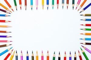 frame from color pencils in a row with the top on a white background. photo