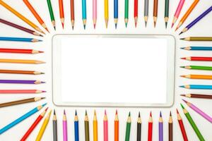 mockup of digital tablet with frame of multicolored pencils photo
