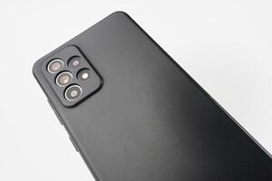 Modern Smartphone Back Highlighting Triple Camera Module photo