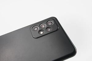 Close-Up of Modern Smartphone Back Highlighting Triple Camera Module photo