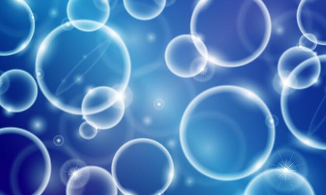 Soap bubbles float on blue water background. soft circles. shiny circles.
