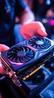 Technician installing new powerful graphics card in desktop computer photo