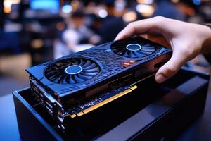 Technician installing new powerful graphics card in gaming computer photo