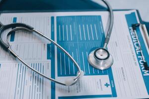 A stethoscope on a medical document photo