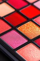 Close-up of a luxurious eyeshadow palette showcasing bold red tones with rich textures and shimmering finishes for glamorous beauty looks photo