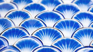 Luxury ceramic plate featuring intricate deep blue seashell patterns showcasing high-end artisan craftsmanship for an elegant dining table setting photo