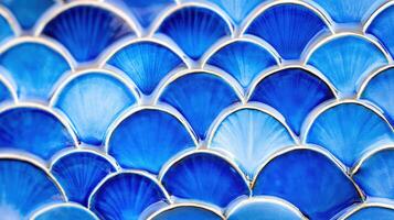 Close-up view of a luxury ceramic plate showcasing exquisite deep blue seashell patterns and intricate artisan craftsmanship photo