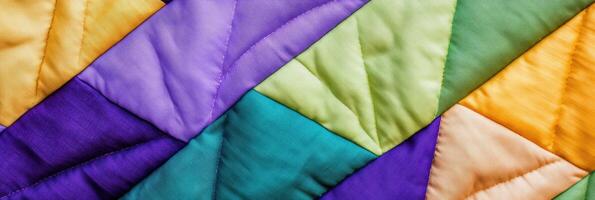Close-up view of intricate handwoven quilt showcasing geometric patterns in purple, green, and yellow fabric patches with meticulous craftsmanship photo