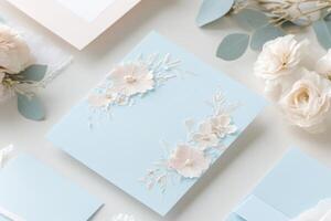 Elegant wedding invitation suite featuring soft pastel colors and floral motifs in duck egg blue and dusty pink for a romantic celebration photo