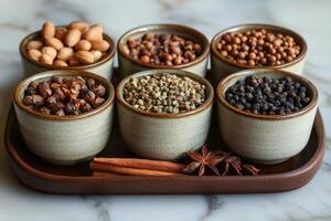 Various spices and herbs displayed on a tray, creating a vibrant culinary scene photo