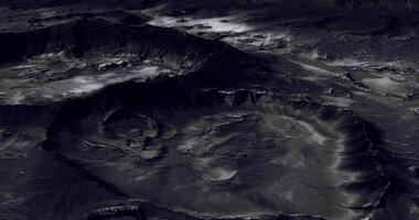 Lunar surface shows craters and highlands in twilight video
