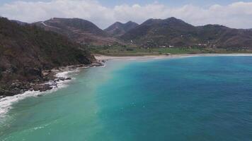 Scenic bay with lush hills and clear waters in Lombok, Indonesia video