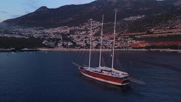 Aerial view. a large yacht is anchored in the bay of Kalkan video