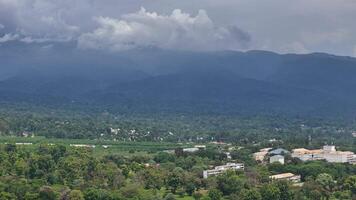 Mountain range with a town in the distance video