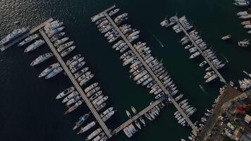Aerial. a large number of yachts are moored at the pier. Gocek Bay video