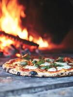 A pizza sitting on top of a stone counter photo