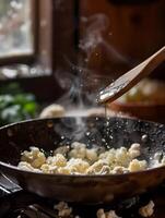 A pan with food being cooked on it photo