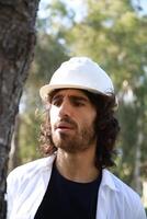 Scientist Fascinated By The Beautiful Trunk Of A Tree In The Countryside photo