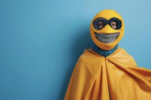 A man in a yellow mask and cape standing in front of a blue wall photo