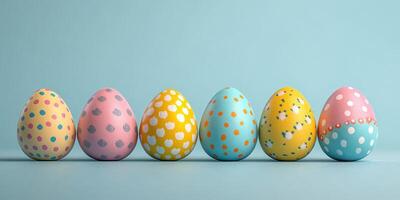 Colorful decorated eggs lined up on a blue background for a festive spring celebration photo