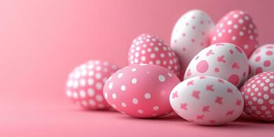Colorful pink decorated eggs arranged on a soft pink background for a festive celebration photo