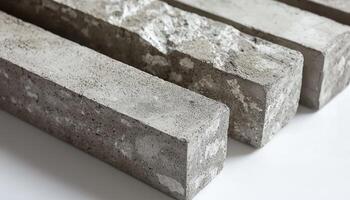Concrete Blocks Arranged In A Row On White Background photo