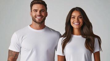 A man and woman in white t - shirts photo