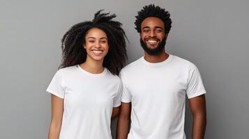 A couple in white t - shirts standing together photo