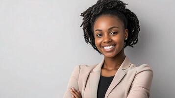 A beautiful young black woman with dreadlocks smiling photo