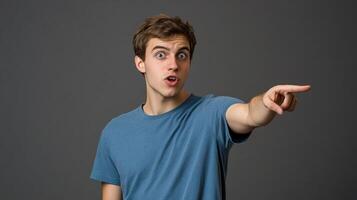 A man pointing at something with his hand photo