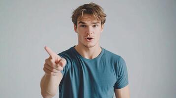 A man pointing at something with his finger photo