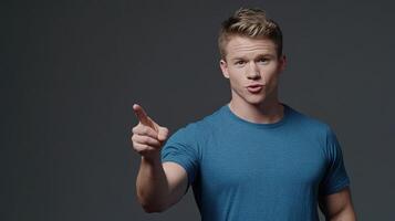 A man pointing at something with his finger photo