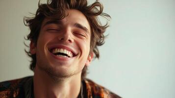 A man is laughing and smiling photo