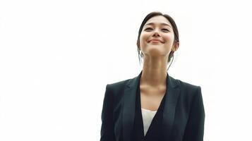 A woman in a business suit is looking up photo
