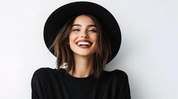 A woman in a black hat smiling photo