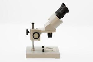 Optical microscope on a clean surface ready for scientific observation in a laboratory photo