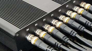 Row of BNC connectors connecting for secure signal transmission photo
