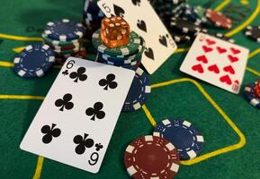 Poker cards with win combination. The player hand holds a winning combination in a game in a poker The concept of luck in the poker game A winning combination in poker is two aces on a table of chips photo