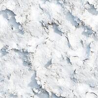 Top view photo of snow with a faint shimmer, seamless texture