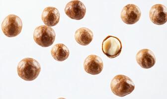 A close up of a bunch of nuts with one nut missing photo