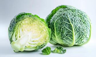 A head of cabbage with a piece cut off photo